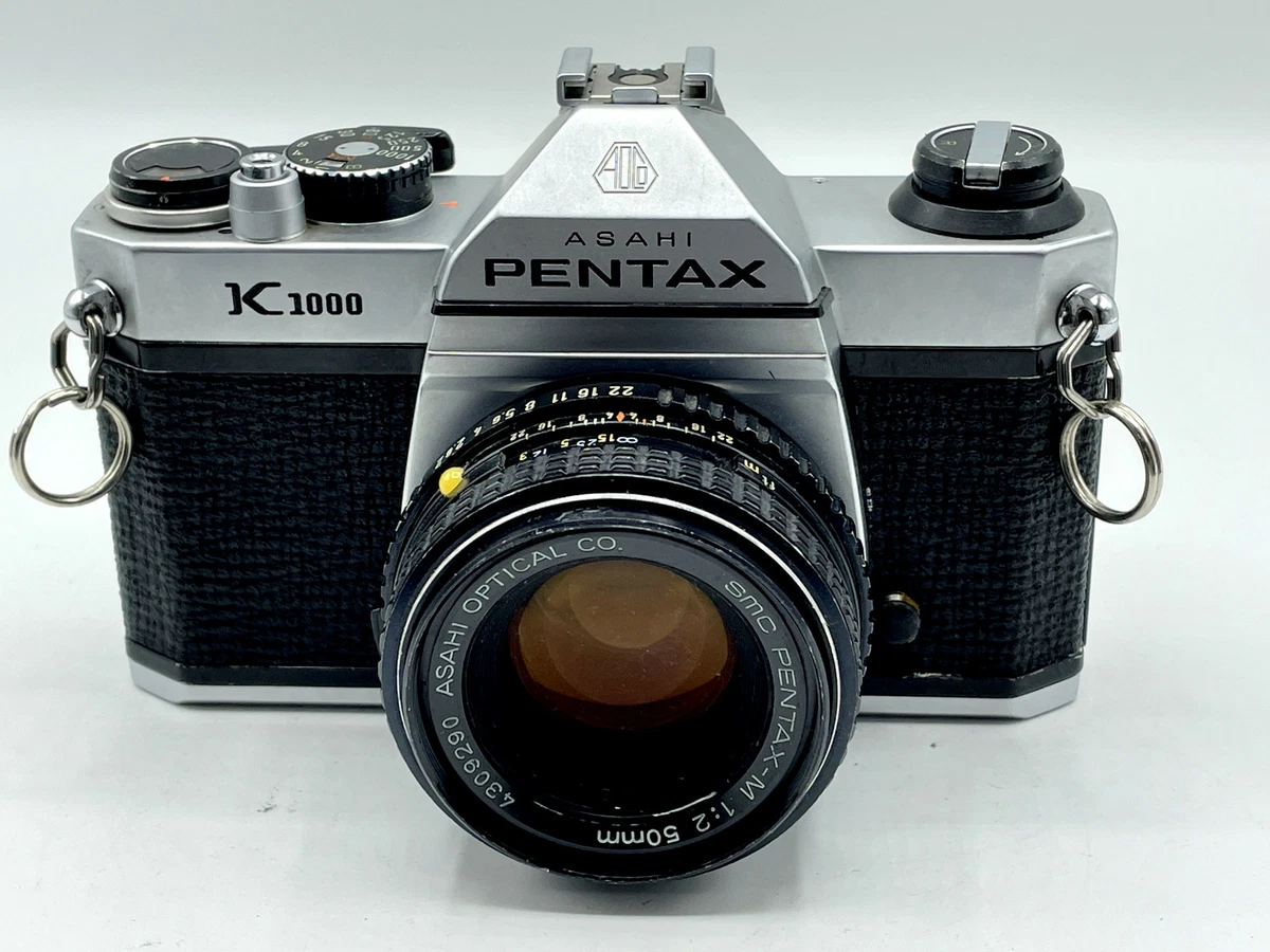 Pentax K1000 SLR film Camera with Ricoh Rikenon P 50mm 12 Kmount lens