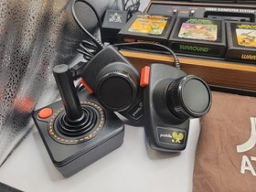 Atari 2600 System Bundle with Console ,8 Games, Joysticks, Paddles, & Dust Cover