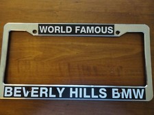 World Famous Beverly Hills Bmw Dealership License Plate Frame. Plastic. New.