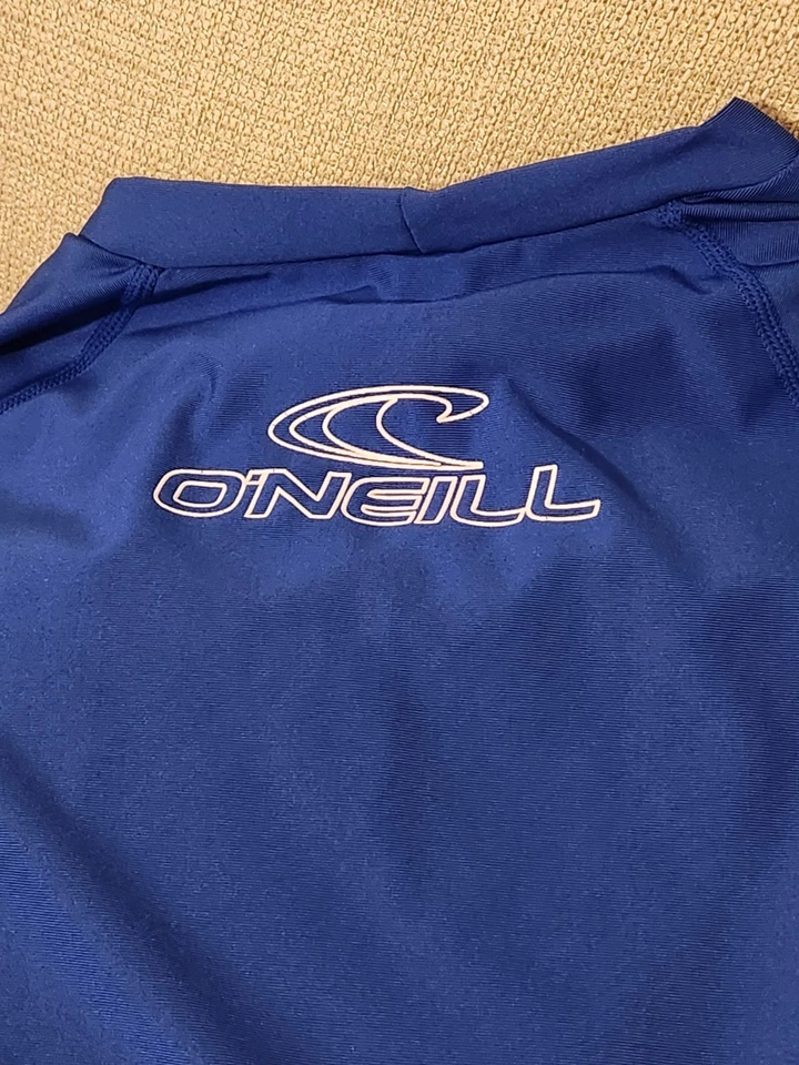 Top protector contra erupciones 2XL azul manga corta O'Neil para hombre Foto 4 de 4