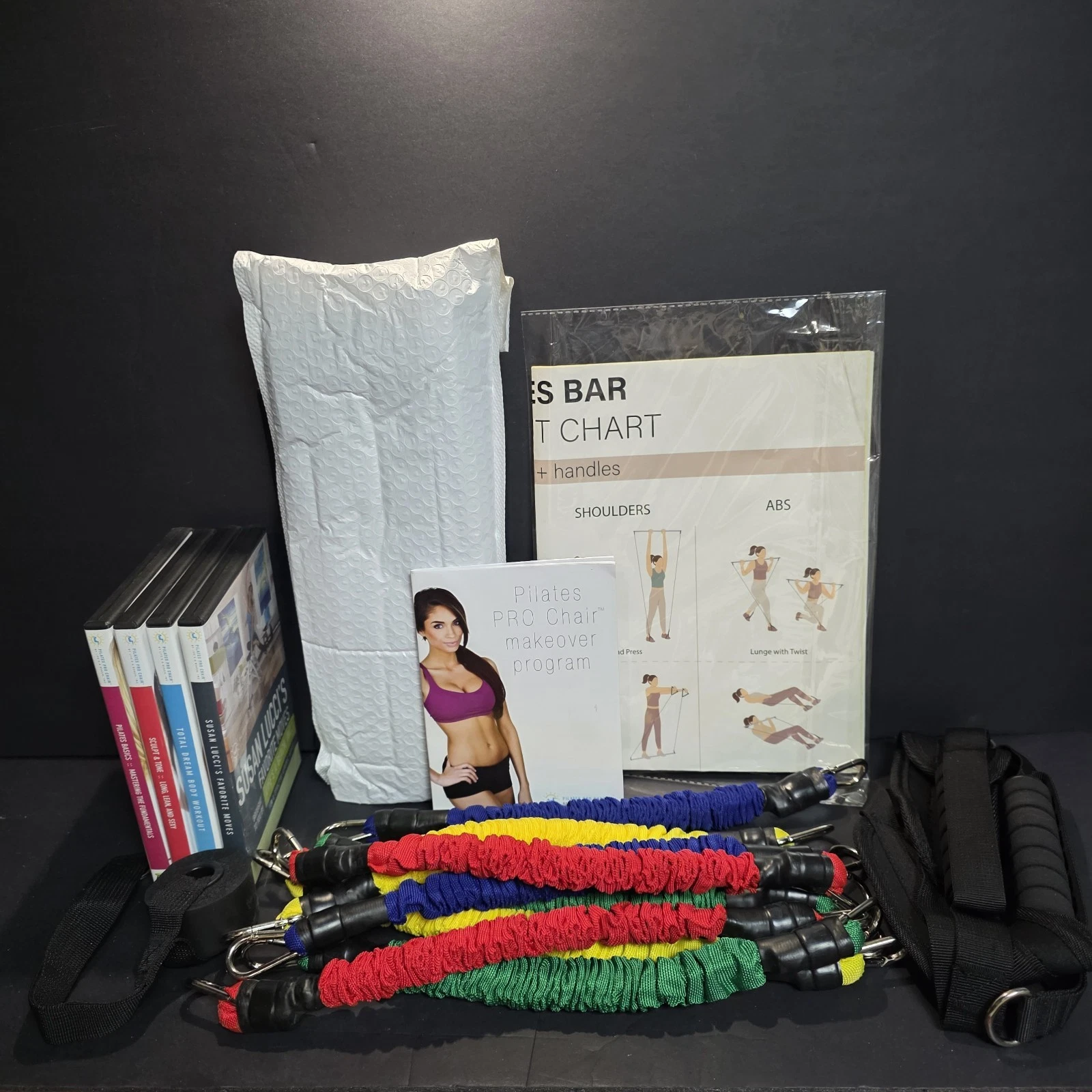 Pilates Resistance Bands With Bar And 4 Pilates Workout DVD's And Chart