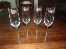 SET OF FOUR NEW RIEDEL CHAMPAGNE FLUTES - 8 3/4" TALL
