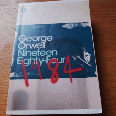 Nineteen Eighty-Four by George Orwell.Paperback book Pre owned.
