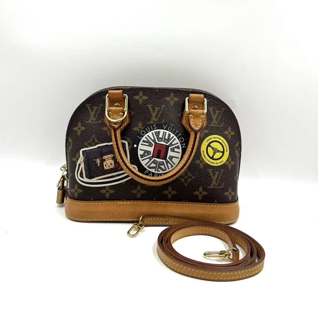 10.21 008 Louis Vuitton Alma BB Monogram Canvas World Tour Handbag  