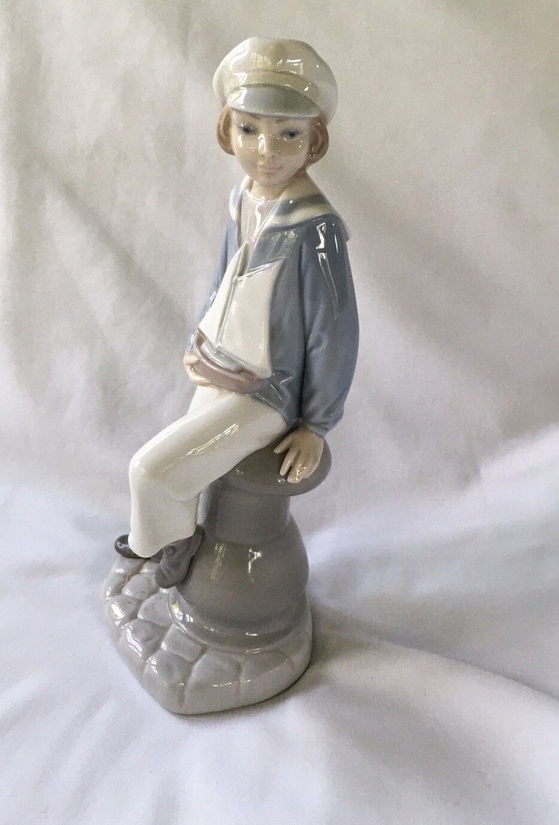 Lladro #4810 Boy with Yacht 9