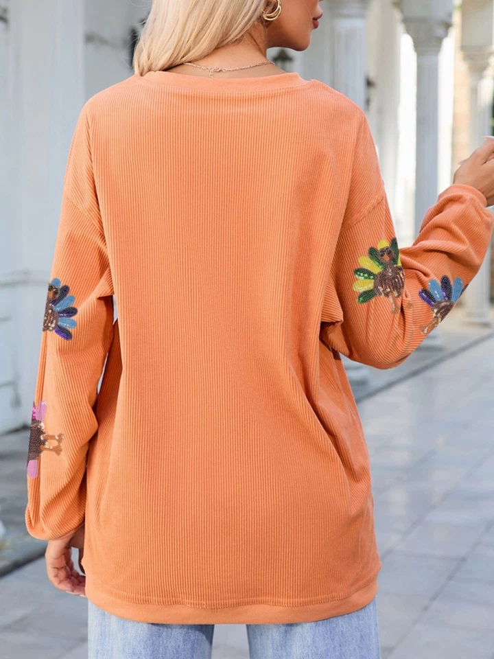 Sudadera holgada con cordón gráfico de pavo - Detalle de lentejuelas - Mandarina - Tallas S-2XL Foto 2 de 4