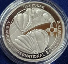 A 1993 ALBUQUERQUE INTERNATIONAL BALLOON FIESTA .999 SILVER COIN BOX COA