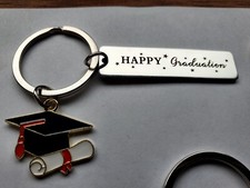 Happy Graduation. 2 Brand New Metal Keychains Keyrings in the Original Bags.