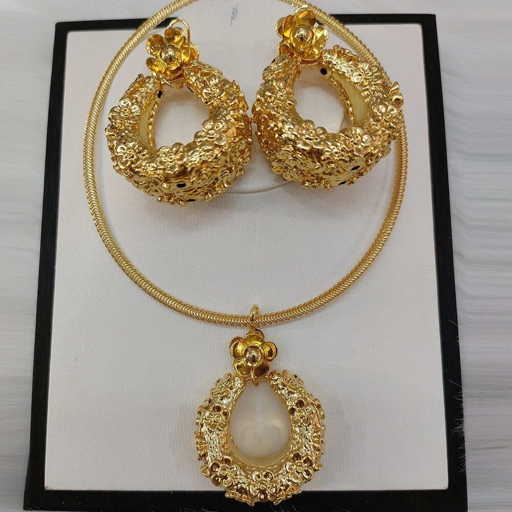 LOUIS VUITTON COSTUME JEWELRY SET OF EARRINGS AND PENDENT