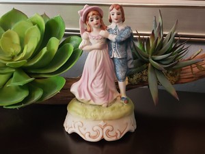 pinky and blue boy figurines