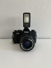 Vintage Vivitar V335 35mm SLR film camera with a Vivitar 102 Detachable Flash