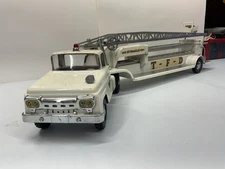 VINTAGE WHITE TONKA FIRE TRUCK WITH LADDERS