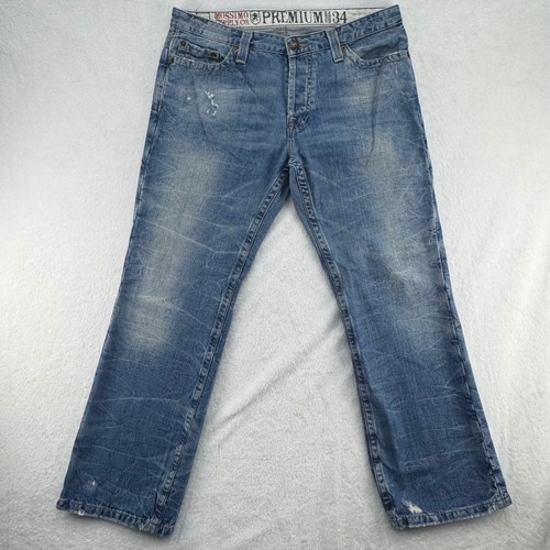 Jeans taille haute coupe droite à boutonnière croisée