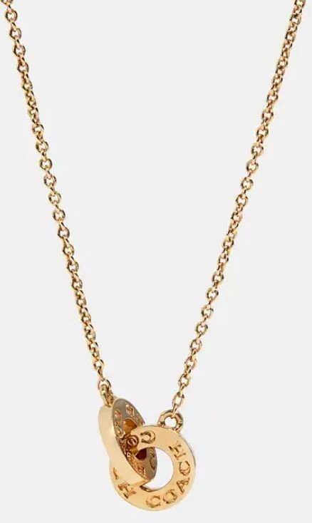 Collana con ciondolo firma ad incastro tono oro Coach