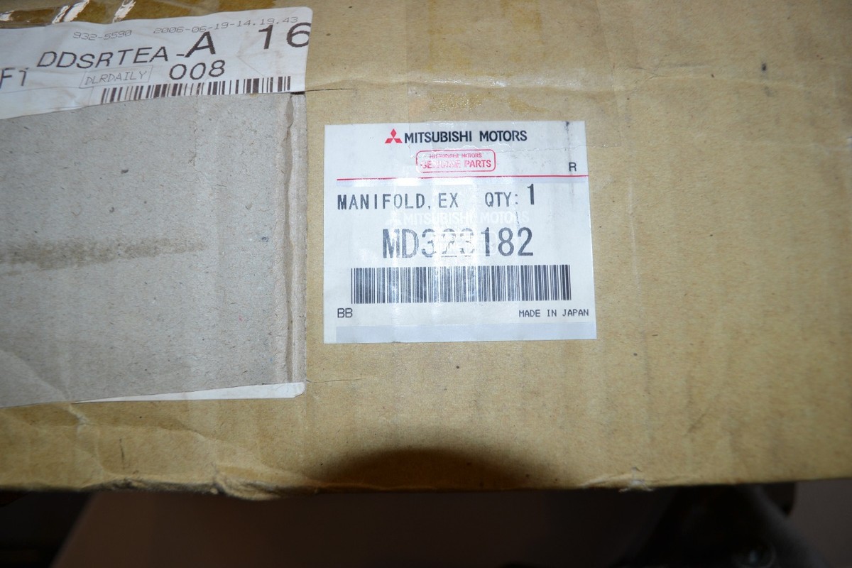 MD323182 NEW GENUINE MITSUBISHI MD323182 EXHAUST MANIFOLD ASSEMBLY 