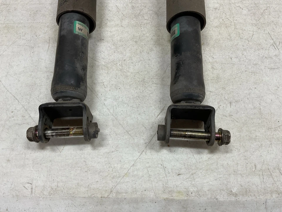 2003-2007 INFINITI G35 COUPE AMORTECEDOR TRASEIRO AMORTECEDOR PAR FABRICANTE DE EQUIPAMENTO ORIGINAL - Imagem 2 de 4