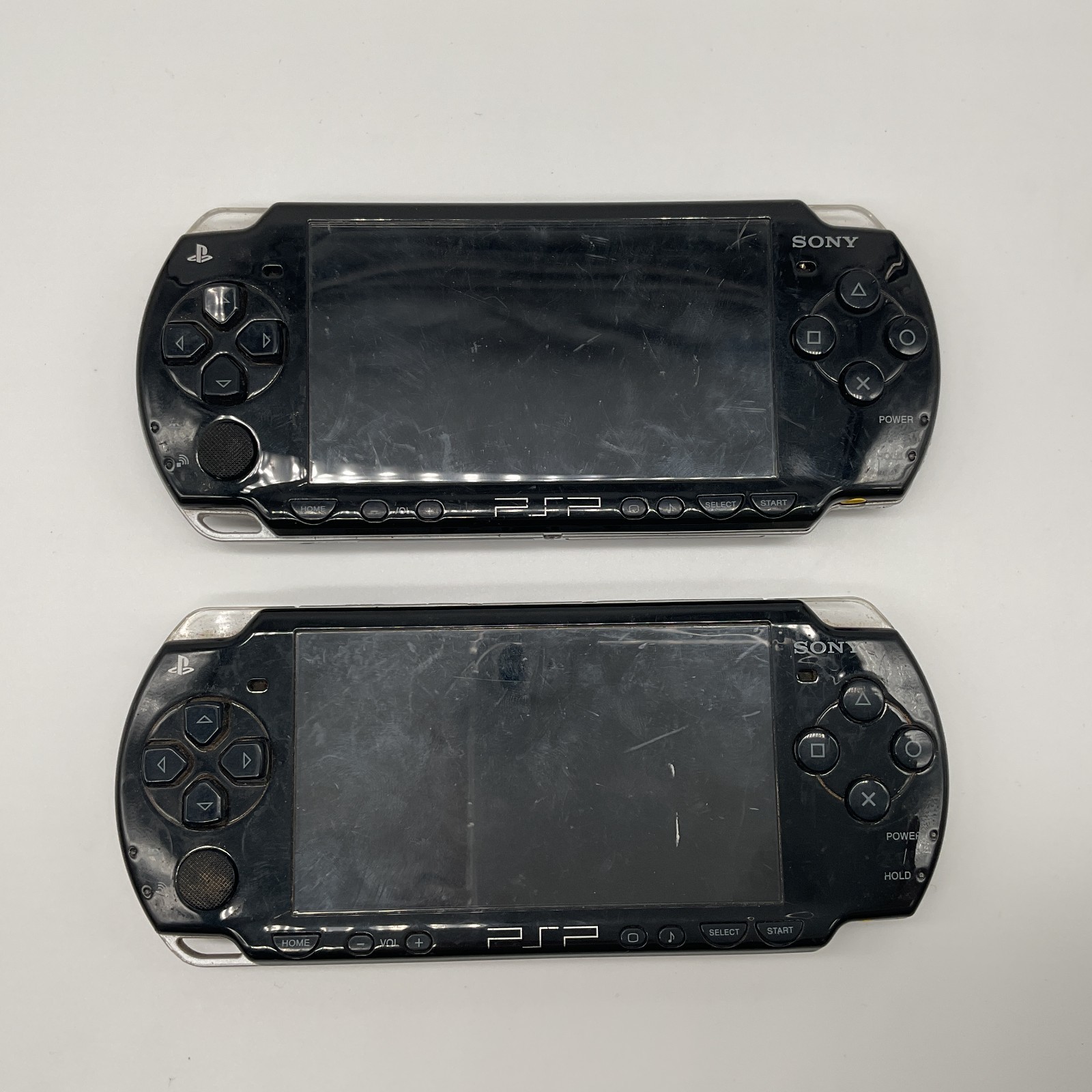 Lote de 2 PSP 2004 sin probar sin batería. Para piezas o reparación