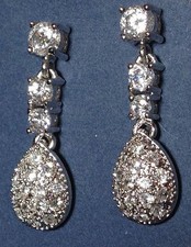 Sterling silver and Cubic Zirconia dangle earrings. EAR290001