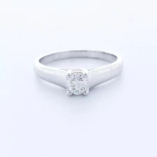 Solitaire Engagement Ring Trellis Platinum 0.60 CT Round Lab-Grown Diamond D VS1