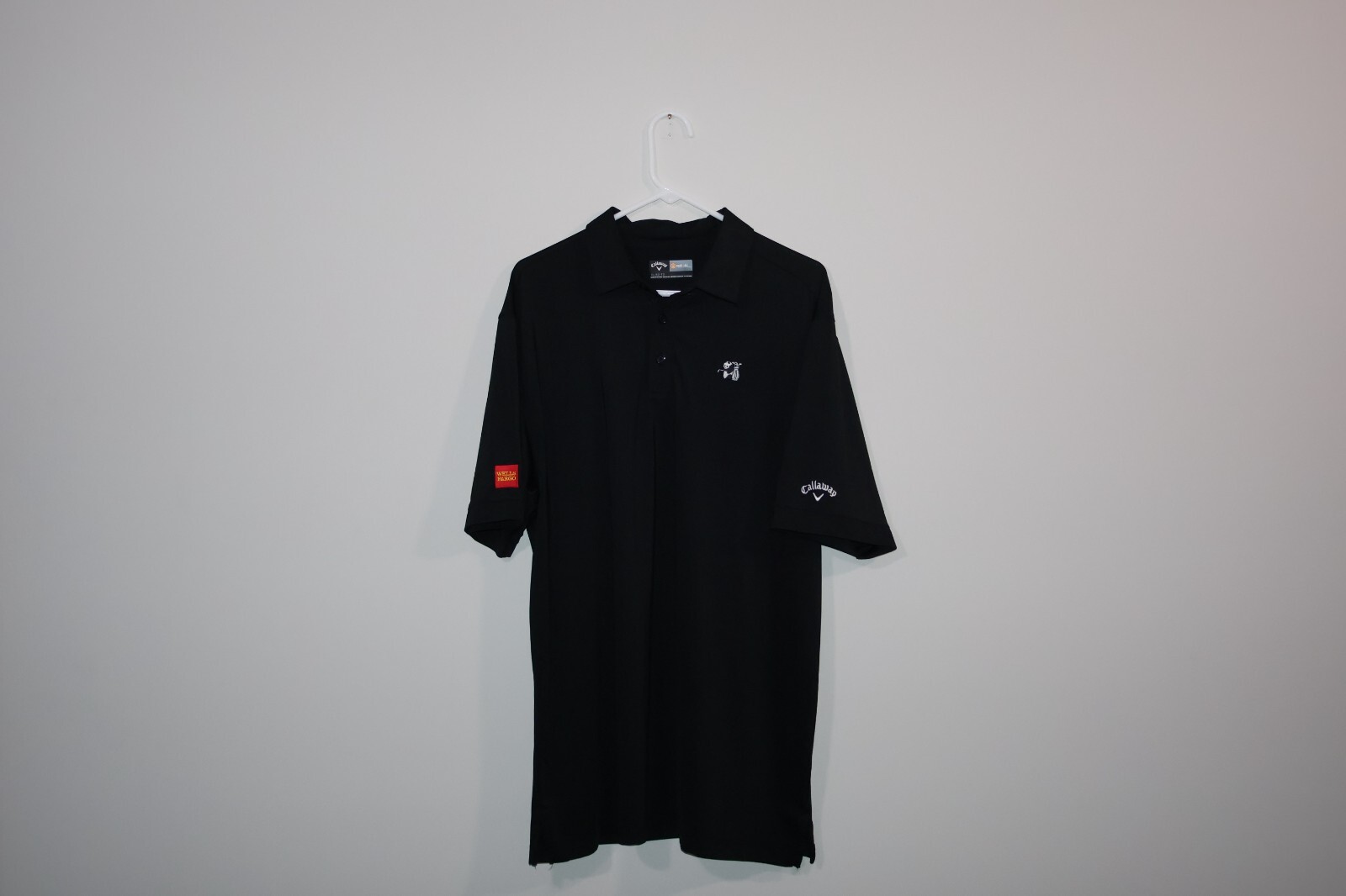 Performance-driven black Callaway polo featuring … - image 1