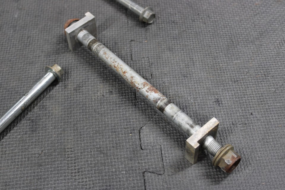 2001 KAWASAKI KX85 OEM FRONT REAR AXLE BACK WHEEL RIM SWINGARM PIVOT