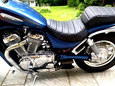 I'll buy a Suzuki Intruder 125 and I'd like to know if there's how to  flatten the seat and tank to the likes of the RE Interceptor 650 :  r/CafeRacers