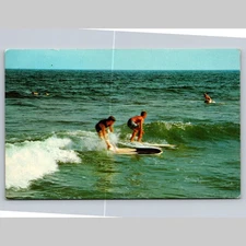 Postcard Surfers Riding Waves Ocean Scene Tichnor Bros.