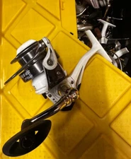 NICE USED Bass Pro Shops Bionic Plus SPINNING Reel White Fishing 6BB BNP40