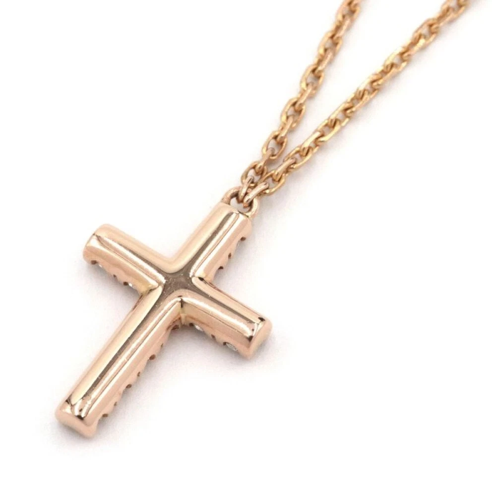 Cartier gold cross necklace hot sale