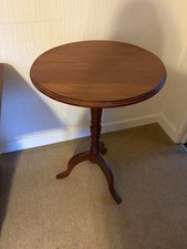 Vintage round wooden occasional side table, tilt top.