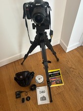 Nikon D40 DSLR Camera with 18-55mm lens, Tripod, Battery, Charger, and manuals-