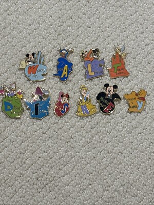 Walt Disney 10 pin Puzzle Set 100th Year W A L T D I S N E Y Mickey Pooh Tink ++