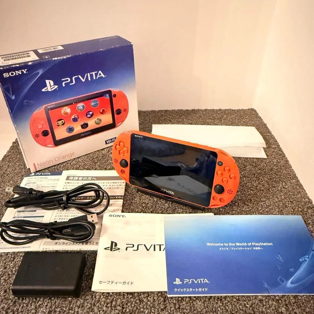 Preços baixos em Sony PS Vita-PCH-2000 Laranja Consoles de
