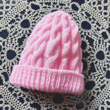 A Pink Hand Knitted Beanie hat 6-12 months in DK yarn