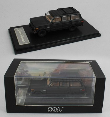 1:64 *596 DIECAST* FLAT BLACK JEEP Grand Wagoneer *NIB*