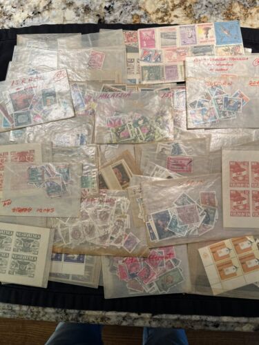 WORLDWIDE STAMPS IN GLASSINES Mixture Of 750 Mint And Used From 30 Countries