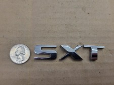 Dodge Oem 2005-2008 Magnum Sxt Chrome Rear Letter Lettering Emblem Badge Logo Dodge Oem 2005-2008 Magnum Sxt Chrome Rear Letter Lettering Emblem Badge Logo