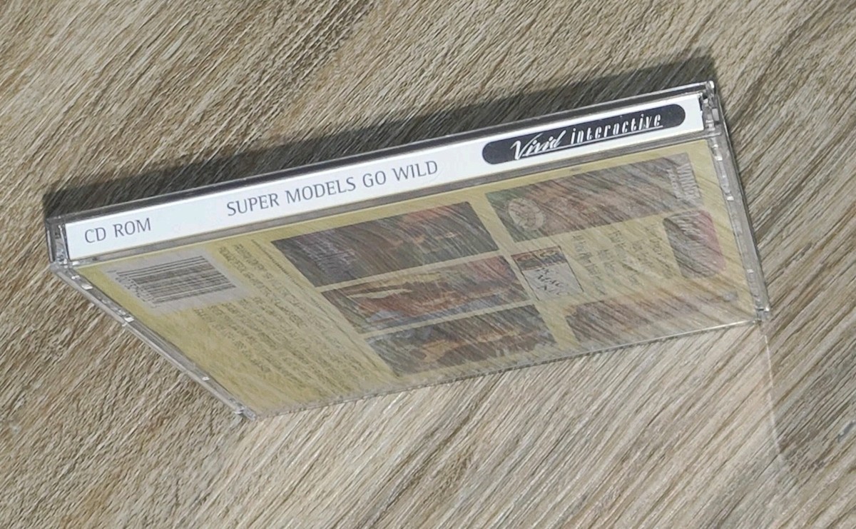 VIVID INTERACTIVE SUPER MODELS GO WILD CD-ROM GAME PC MAC NEC MINT
