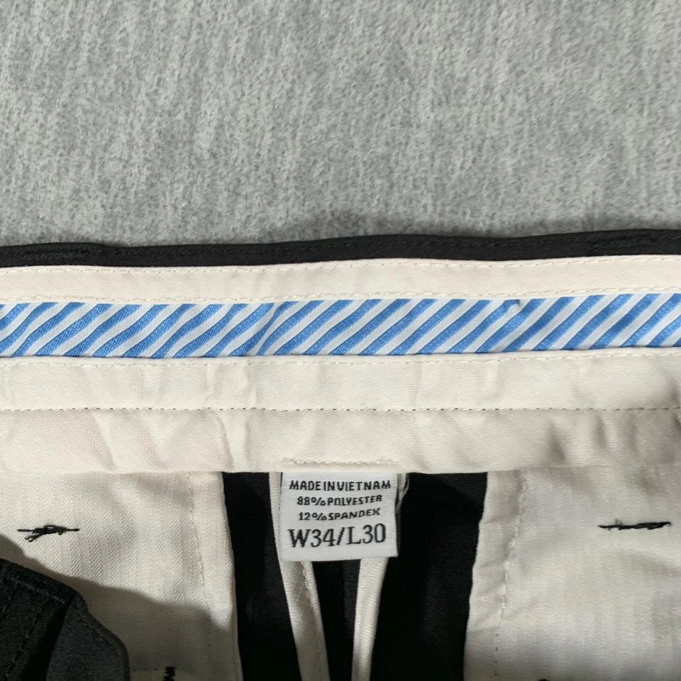 Pantalones de golf FootJoy para hombre 34x30 negros rendimiento elásticos frente plano tecnología chinos Foto 4 de 4