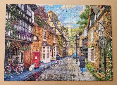 1000 Teile Puzzle von RAVENSBURGER genannt MEADOW HILL LANE.