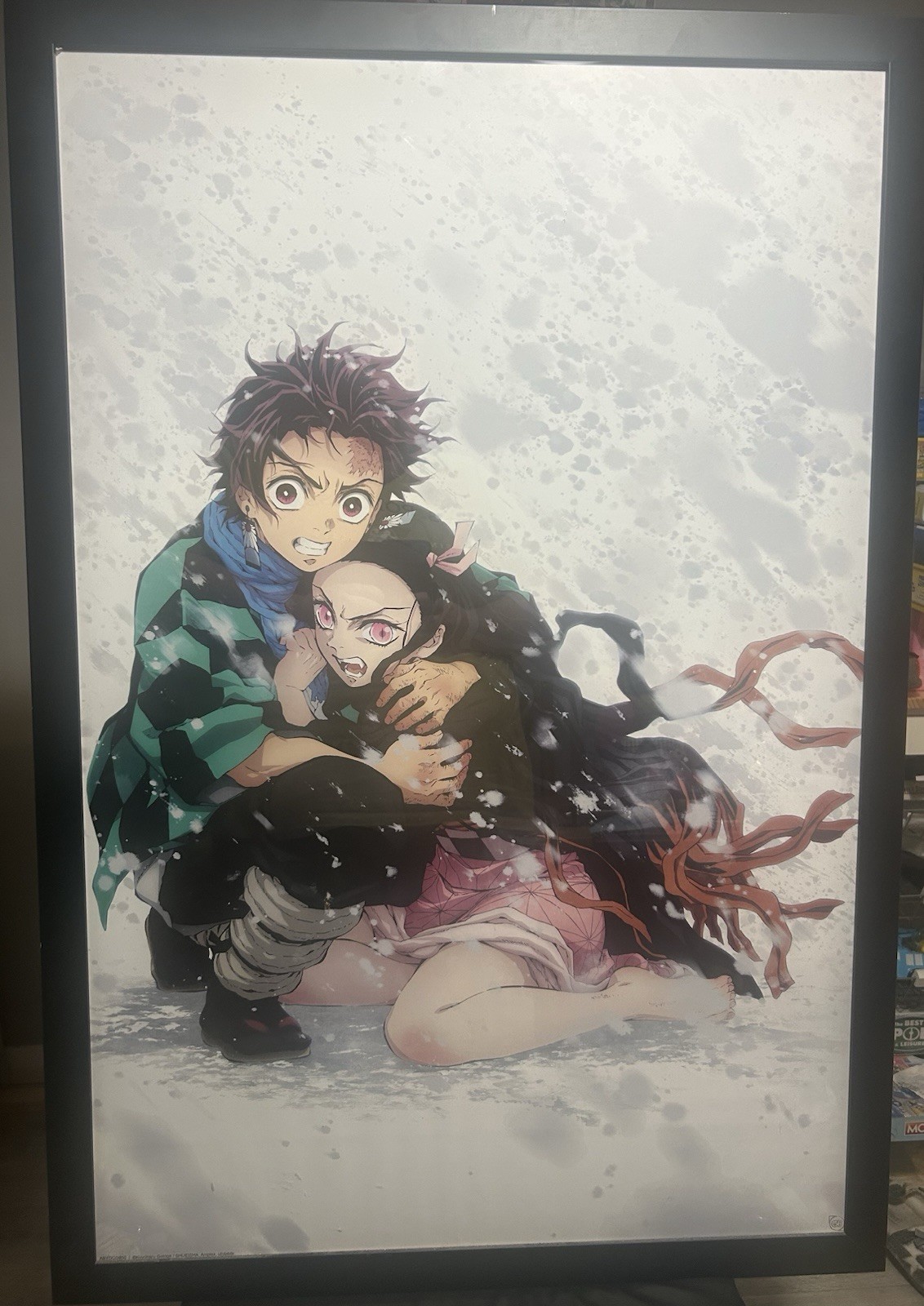 Demon Slayer Framed Poster: Tanjiro & Nezuko Snow Scene. Black Frame. 98 x 67cm