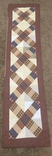 Handmade quilted table runner multicolored design in fall/brown colors