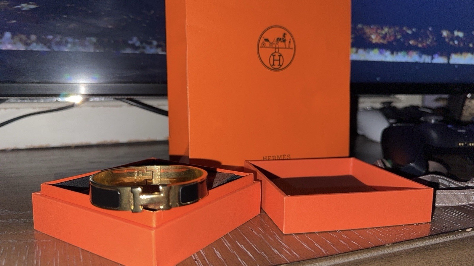 Hermès Clic H enamel bangle bracelet with gold-tone hardware