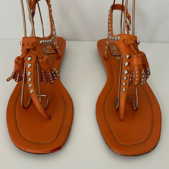 Prada Orange Leather Flat Studded Tassel Accents T Strap Thong