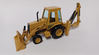 CATERPILLAR -CAT 428 Baggerlader Hammer - NZG - 1:50 - neuwertig -WSI-CONRAD-IMC