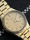 Seiko Men’s  SQ Date Vintage Watch Gold Tone Stainless Steel Strap 5H22-7A10
