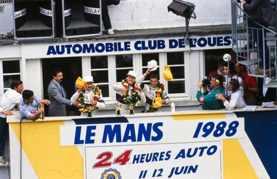 Jan Lammers Johnny Dumfries and Andy Wallace celebrate victory th- 1988 Photo