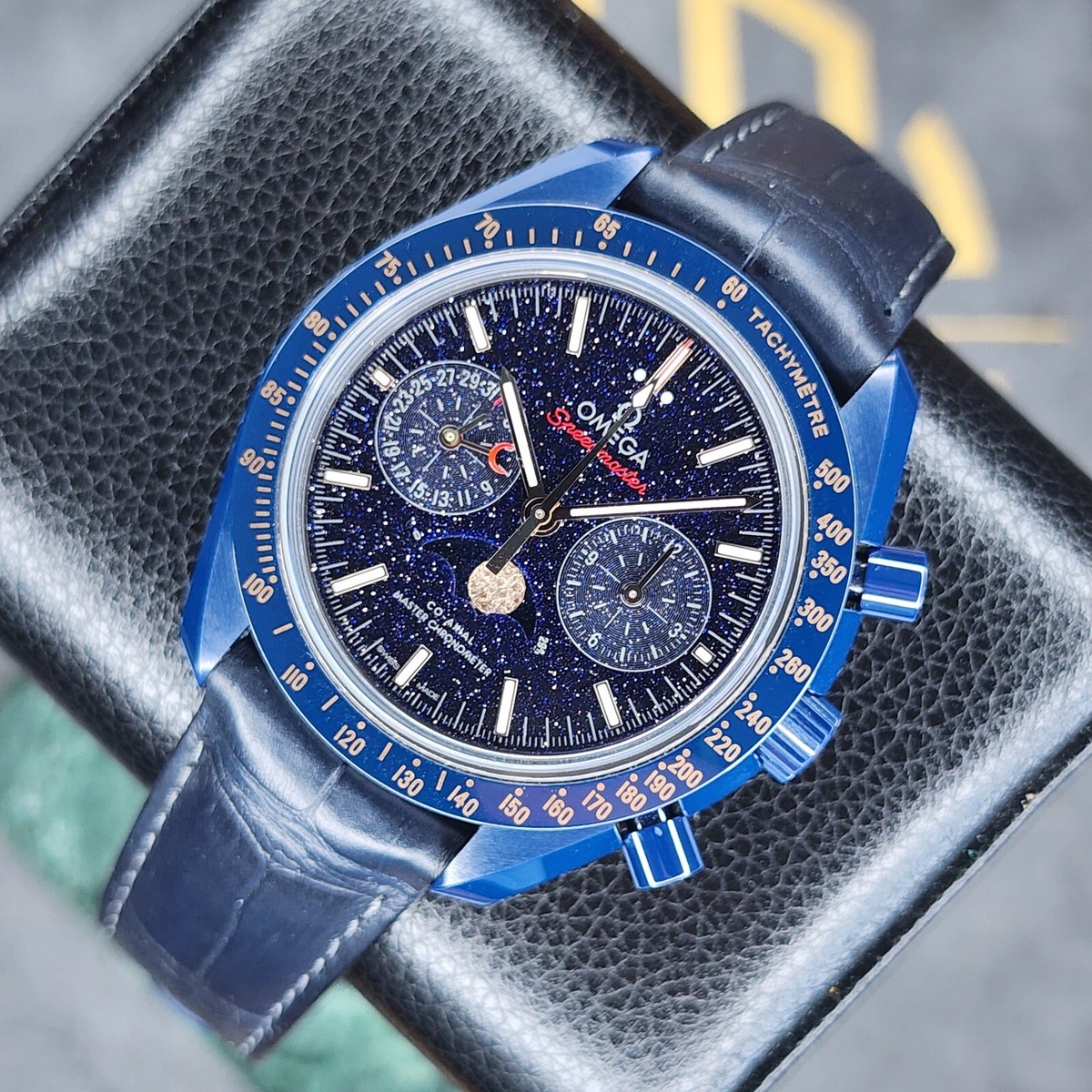 OMEGA SPEEDMASTER 44.25MM BLUE SIDE OF THE MOON CERAMIC AVENTURINE