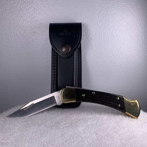 Buck® 110 Folding Hunter Lock-back Knife, Brass Bolster with Leather Sheath - Picture 5 of 8