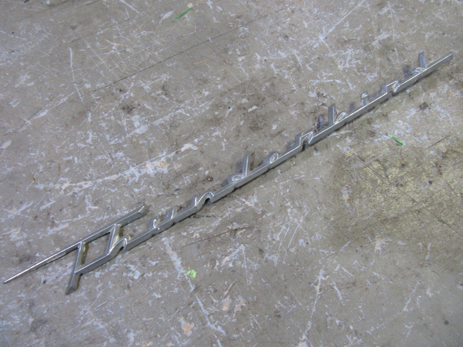 1958 Ford Thunderbird exterior fender THUNDERBIRD chrome emblem trim molding